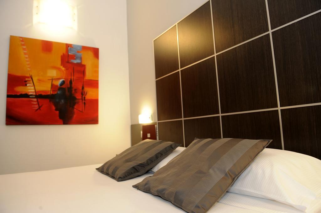 Hotel Rome Place Quarto foto